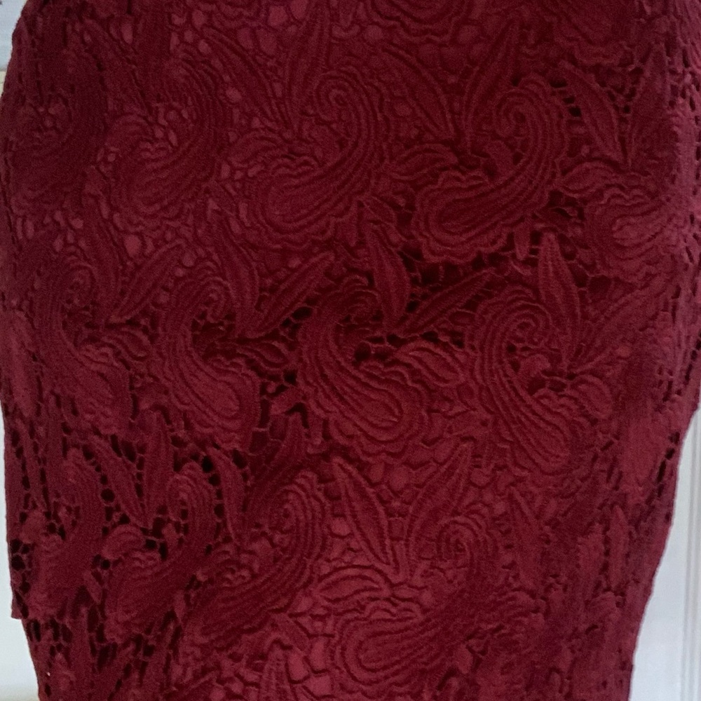 Red skirt  (wine color) was use but is in good condition.